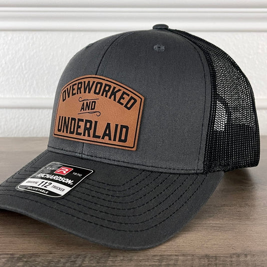Overworked And Underlaid Funny Leather Patch Hat Charcoal/Black Patch Hat - VividEditions