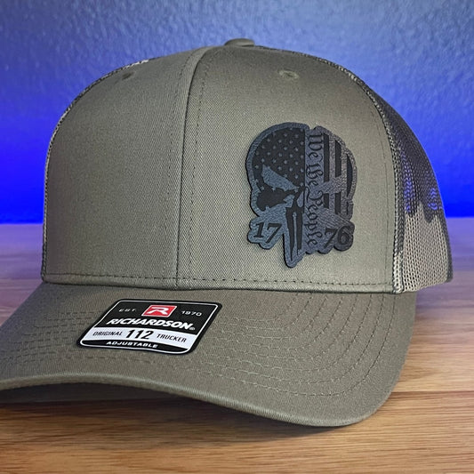 PUNISHER SKULL 1776 WE THE PEOPLE Black Side Leather Patch Hat Green/Camo Patch Hat