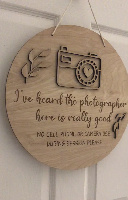 Photography studio prop sign for photographers. No camera, phone, devices.