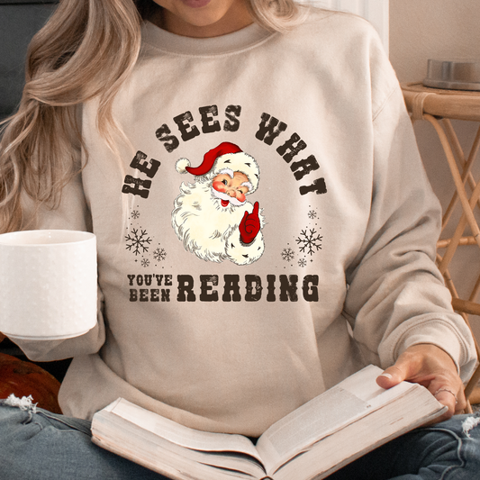 He Sees What You've Been Reading Santa Sweatshirt Chrismas Sweater